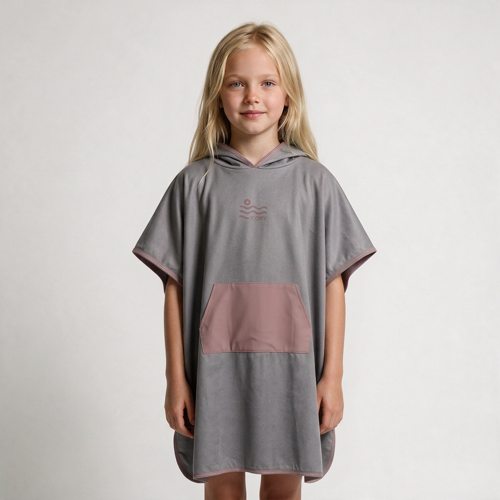 Gray and dusty-rose poncho on blonde girl