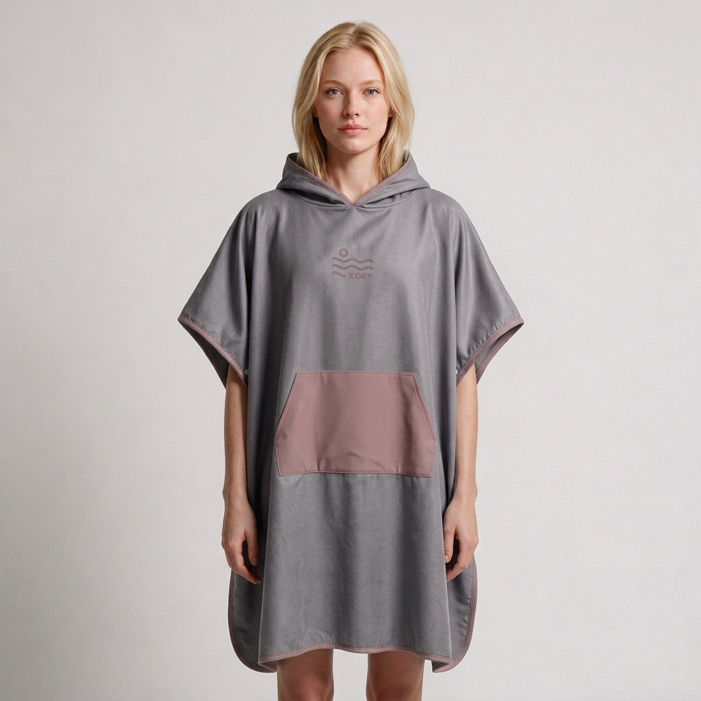 Gray and dusty-rose poncho on blonde woman
