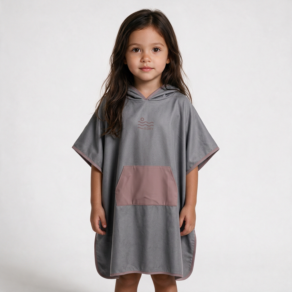 Gray and dusty-rose poncho on dark-haired girl