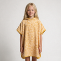 Leopard-print poncho on blonde girl