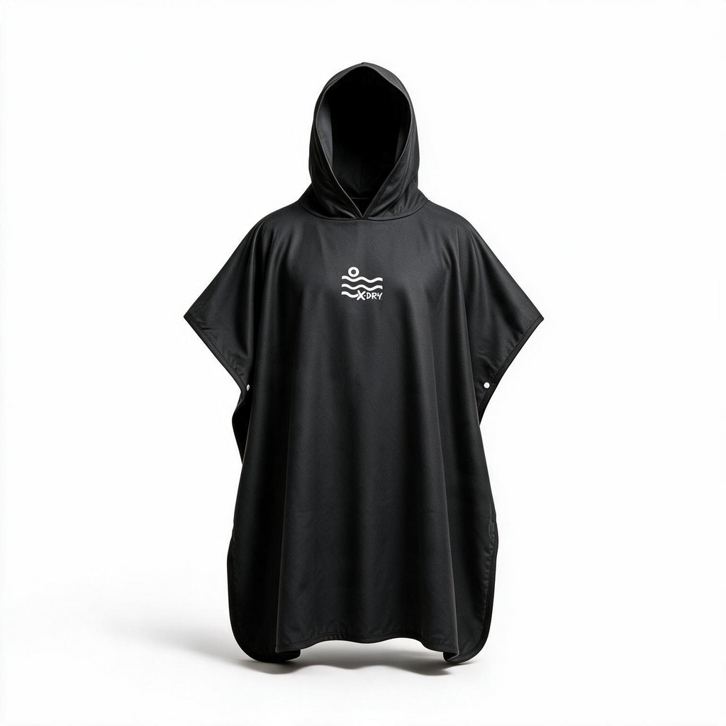 A black hooded poncho with a white wave logo on the chest, displayed on a white mannequin against a plain white background.