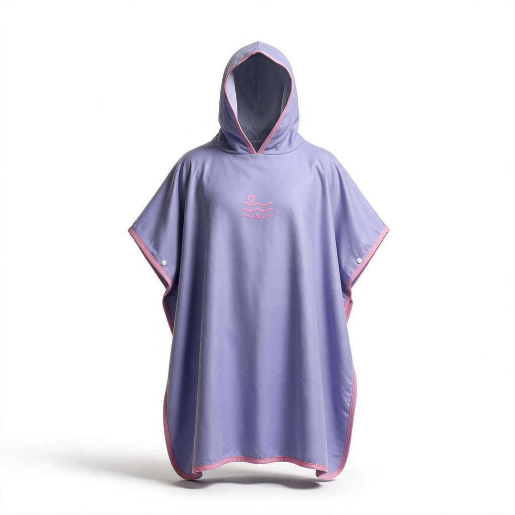 A lavender purple hooded poncho with pink trim and a pink wave logo on the chest, displayed on a white background.