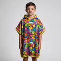 Monster-print poncho on boy